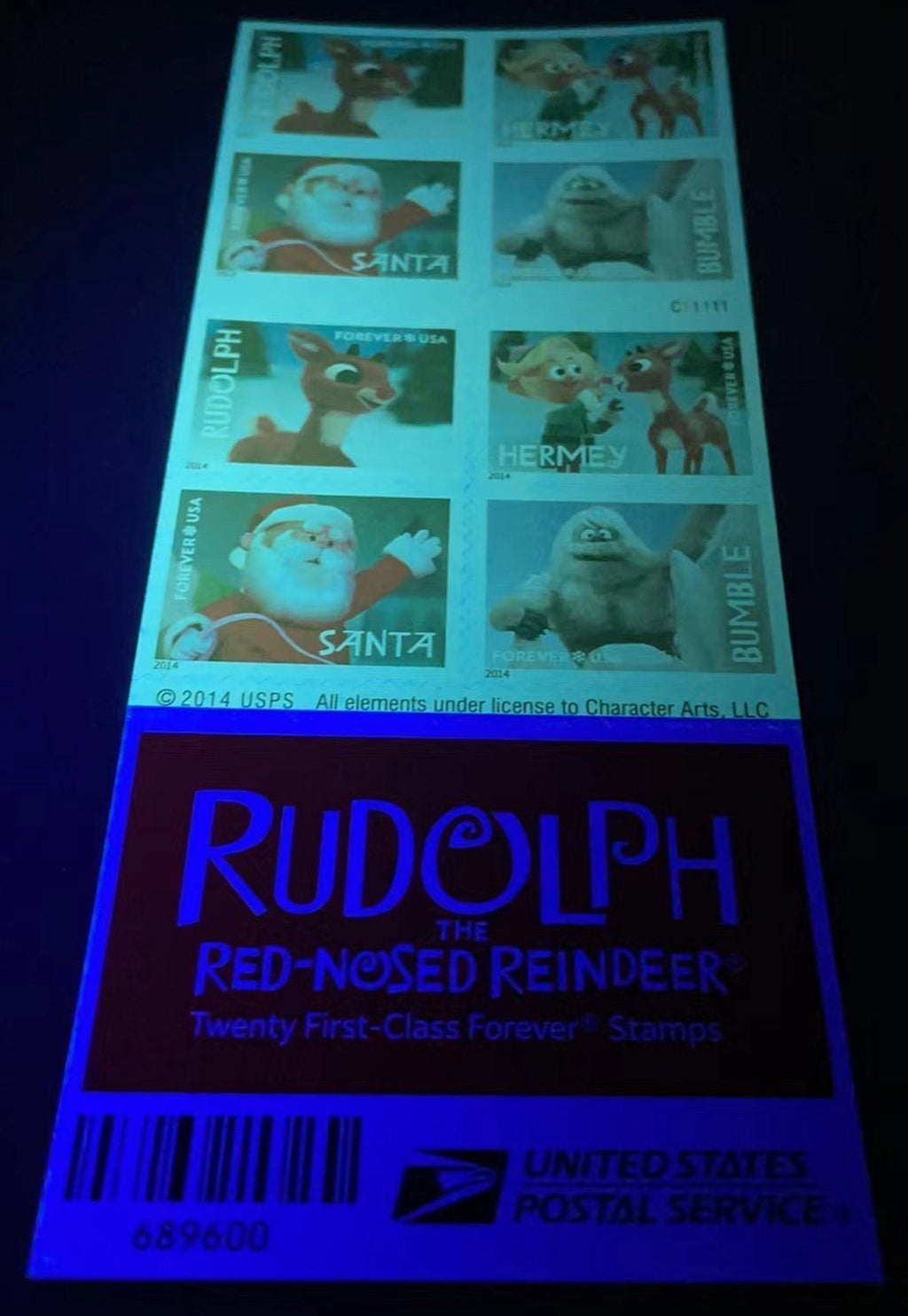 Rudolph stamp booklet under ultraviolet authentication light