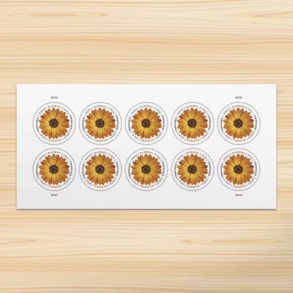 Global African Daisy international stamp strip