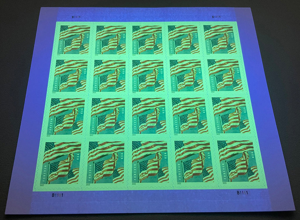 2022 U.S. Flag stamp booklet under ultraviolet authentication light